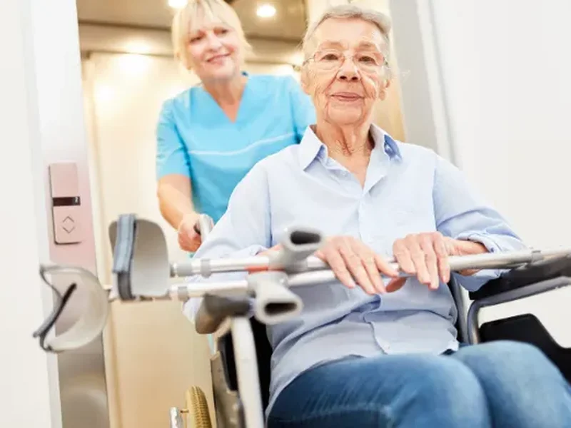 Physical therapist assessing a patient's movement related to stroke recovery